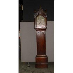 Une horloge de parquet de la fin du 18e Siècle en chêne, le cadran en métal gravé signé: "Thomas...