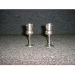 Un ensemble de 12 verres à liqueur en argent en forme de chardon, poinçons de Sheffield, 1929, Ma...