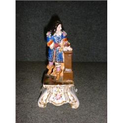 Une figurine en porcelaine de Paris du milieu du 19e Siècle dans le style de Jacob Petit représen...