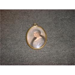 Un portrait miniature d'Elodie Garneau, petite fille de Maximilien Globensky, signé....