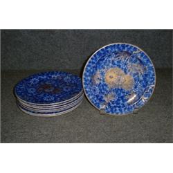 Un ensemble de 8 assiettes à dessert en semi-porcelaine de Doulton Burslem à décor fleuri doré su...