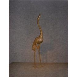 Un sujet en bronze de Vienne patiné représentant une grue, estampé: "Austria"....