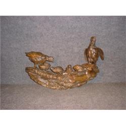 Un groupe mural en bronze patiné représentant 2 perdreaux et leurs 4 petits....