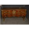 Image 1 : Une commode en bois de placage de style Louis XV d'après 1a commode de Charles Cressent dans la W...