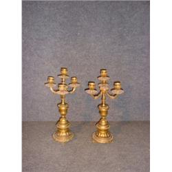 Une paire de candélabres de style Régence à 4 branches de lumière en bronze doré, sur des bases c...