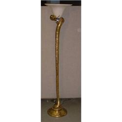 Une lampe "Cobra" de parquet dans le goût d'Edgar Brandt, le serpent en bronze doré supportant un...
