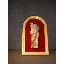 Un relief en porcelaine polychrome représentant Saint Christophe portant l'enfant Jésus....