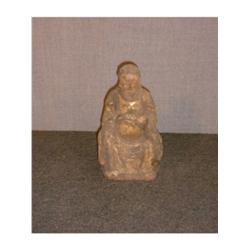 Une sculpture sur bois chinoise ancienne, représentant une divinité assise, traces de dorure....