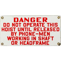 Red on White "Danger" Sign