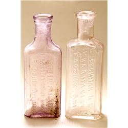 Two Different Phoenix Drug Bottles