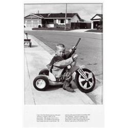 BILL OWENS (B. 1938) RICHIE (SUBURBIA SERIES) SIGNED, STAMPED, NUMBERED OF 15 AND DATED ON THE RE...
