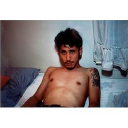 NAN GOLDIN (B. 1953) KEE IN BED E. HAMPTON, N.Y., 1988 SIGNED, TITLED AND DATED ON THE REVERSE CI...