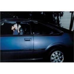 ANDREW BUSH (B. 1957) UNTITLED (WOMAN IN CAR) COLOR PHOTOGRAPH MOUNTED ON PLEXIGLAS 271/4 X 271/4...