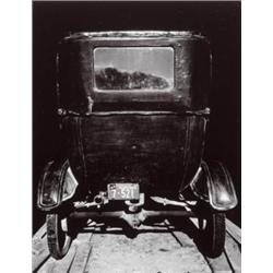 WRIGHT MORRIS (1910-1992) MODEL T IN A SHED, THE HOME PLACE NEAR NORFOLK, NEBRASKA GELATIN SILVER...
