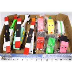 FLAT OF HAND CRAFTED WOODEN HELICOPTERS AND CARS