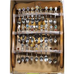 LOT OF 2 COLLECTOR SPOONS AND RACKS