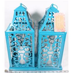 PAIR OF BLUE METAL LED FLAMELESS CANDLE HOLDERS