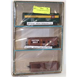 GROUP OF THREE HO SCALE TRAIN CARS