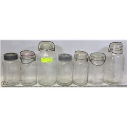 FLAT OF 7 VINTAGE JARS ALL WITH LIDS