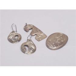 Native Carved Silver Pendants and