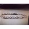 Image 1 : BRACELET - 6.84 CTW (12) OVAL FACETED WHITE TOPAZ & ROUND FACETED DIAMOND IN STERLING SILVER INFINIT