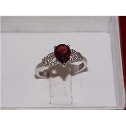 RING - PEAR FACETED GARNET & 2 DIAMONDS IN STERLING SILVER SETTING - RETAIL ESTIMATE $335
