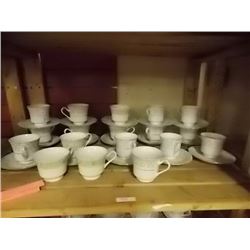 TEA CUPS AND SAUCERS