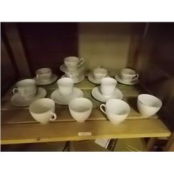 TEA CUPS AND SAUCERS