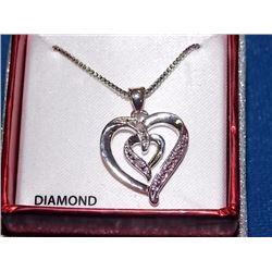 NECKLACE - 2 ROUND FACETED WHITE DIAMONDS IN STERLING SILVER HEART DESIGNED SETTING - RETAIL ESTIMAT