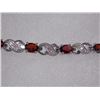 Image 2 : BRACELET - 12 OVAL FACETED RICH DEEP RED/BROWN GARNETS IN STERLING SILVER CROSS OVER LINK DESIGN SET