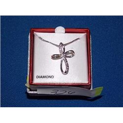 NECKLACE - 2 ROUND FACETED WHITE DIAMONDS IN STERLING SILVER CROSS DESIGNED SETTING - RETAIL ESTIMAT
