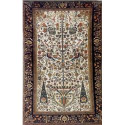 Isphahan Garden Rug, Second Quarter 20th Century, Beige ground with flowering urn, birds, cyp...