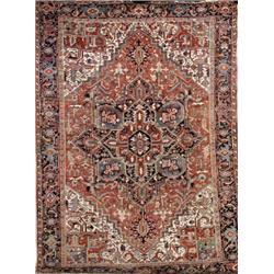 Heriz Rug, First Quarter 20th Century, Red ground with herati field centering a star medallio...