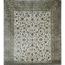 Keshan Rug, Post 1950, Beige ground with palmette and trellising vine field within a palmette...