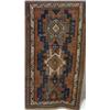 Image 1 : Caucasian Rug, Circa 1900, Red ground centering a stepped elongated medallion enclosing three...