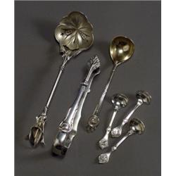 Three American Silver Flat Table Articles, The first, a pierced ladle, unmarked, having a gilt...