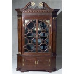 George III Parcel Gilt Mahogany Corner Cupboard, Composed of 18th Century Elements, In two pa...