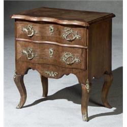 Louis XV Style Ormolu Mounted Walnut Commode, Late 19th Century, Some repairs and cracking to...