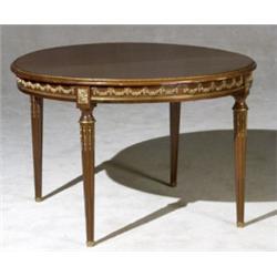 Louis XVI Style Ormolu Mounted Mahogany Dining Table, 20th Century, Together with two leaves....