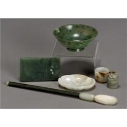 Group of Nine Chinese Jade, Jadeite and Amber Carvings, 19th-20th Century, Consisting of a sp...