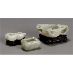 Group of Three Chinese Pale Celadon Jade Brushwashers, 19th Century, The first, a double-gour...