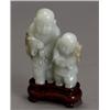 Image 1 : Chinese Russet Light Celadon Jade, Group of Two Boys, 20th Century, Height: 5 in (12.7 cm)...