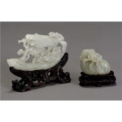 Two Chinese Pale Celadon, Jade Carvings, 18th-19th Century, The first, a recumbent mandarin...