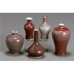 Group of Ten Chinese Red Glazed Cabinet Vases and a Paste Box, 18th-19th Century, Of various...