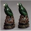 Image 1 : Pair of Chinese Export Green and Aubergine Glazed Parrots, 20th Century, Each with a gilt dec...