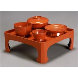 Japanese Red Lacquer Dinner Service, 20th Century, Consisting of ten square trays with raised...