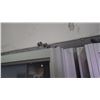 Image 2 : Approximately 5 glass panels/sliding doors with aluminum frames on rollers