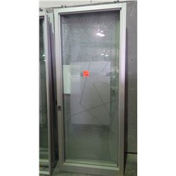 Approximately 4 glass panels/sliding doors with aluminum frames on rollers