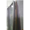 Image 2 : Approximately 4 glass panels/sliding doors with aluminum frames on rollers
