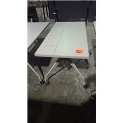 Height adjustable work table on wheels